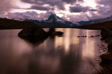 Beautiful scenery in the Swiss Alps in summer, with Matterhorn peak in the background