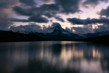 Beautiful scenery in the Swiss Alps in summer, with Matterhorn peak in the background