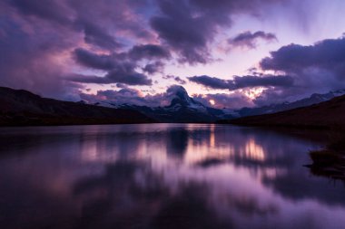 Beautiful scenery in the Swiss Alps in summer, with Matterhorn peak in the background