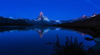 Beautiful scenery in the Swiss Alps in summer, with Matterhorn peak in the background