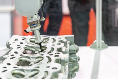 yüksek teknoloji kesinlik vakum emici emme montaj emme vanası sırasında silindir başlı motor veya motorlu araç endüstriyel üretim sürecinin ürünleri ile yüksek teknoloji otomatik seçim