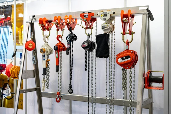 Various kind of industrial manual chain hoist such as hand pull and lever type for lifting object and reduce work load storage on hanger line