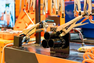 locking chain pliers for fix or clamp during lock 3 metal or steel pipe in manufacturing process in industrial