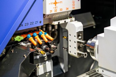 Close up various cutting tool set up at tool holder magazine of cnc automatic machining center