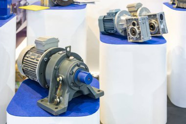 reducer gearbox assemble with electric motor for manufacturing machine on table