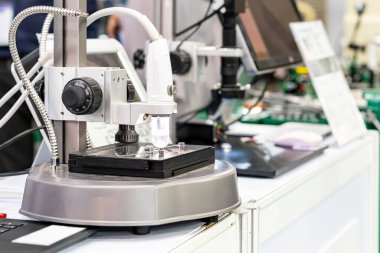 High quality video microscope during inspection drill bit on stage for appearance check and etc of quality control in industrial