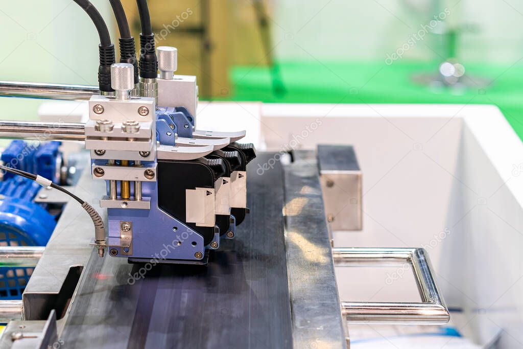 Inkjet print head component of continuous label or graphics printer machine for manufacturing process in industrial