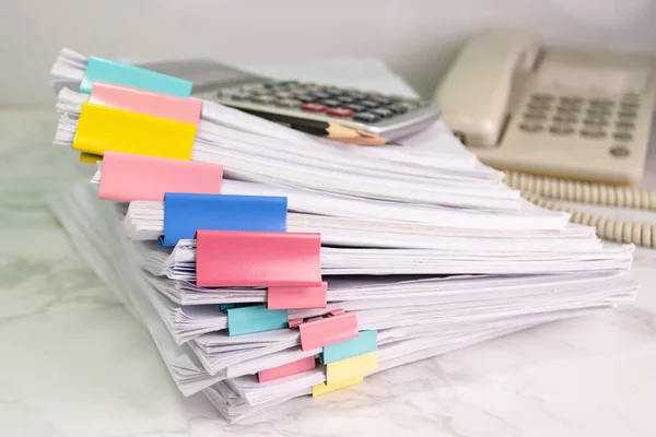 file folder and Stack of business report paper file on the table in a work office, concept document in work office