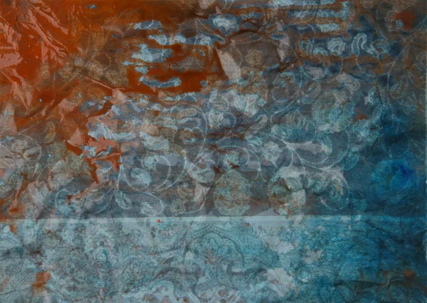 Paper with gray, orange, and blue paint abstract