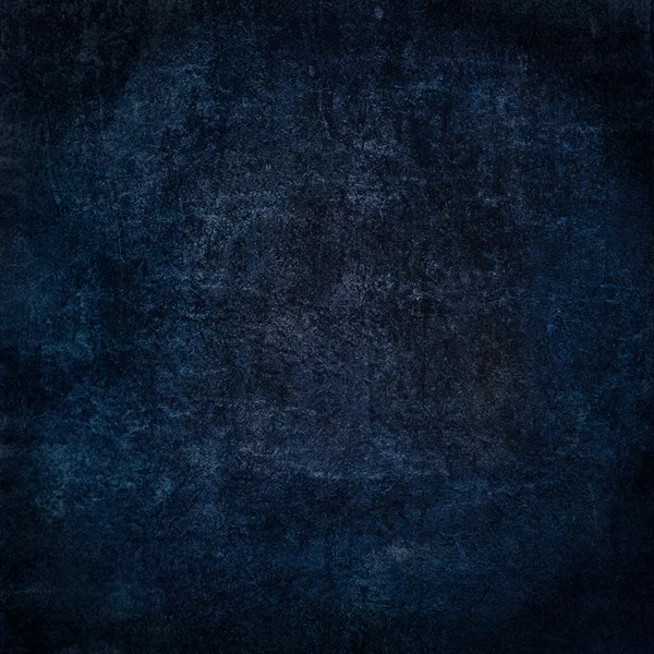 Abstrakt blå baggrund eller papir med lyst center spotlight og mørk ramme med grunge baggrund tekstur - Stock-foto
