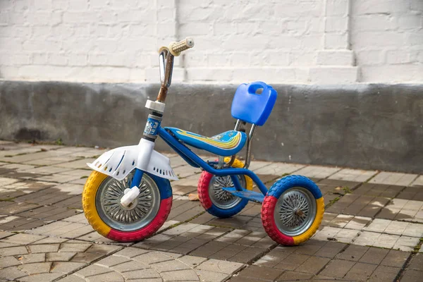 Moscow, Russia - September 5, 2021. Worn colorful kids tricycle — Stock Photo, Image