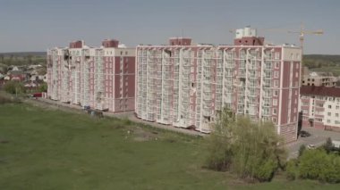 Destroyed residential modern house after air attack. War in Ukraine. Catastrophe. Holes in the walls from shells. Catastrophe. Aerial. Gostomel city. 