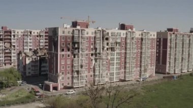 Destroyed residential modern house after air attack. War in Ukraine. Catastrophe. Holes in the walls from shells. Catastrophe. Aerial. Gostomel city. 