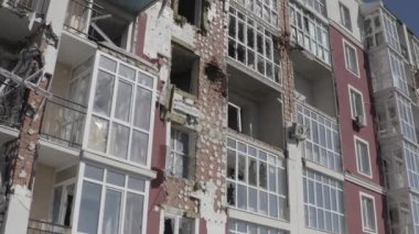 Destroyed residential modern house after air attack. War in Ukraine. Catastrophe. Holes in the walls from shells. Catastrophe. Aerial. Gostomel city. 