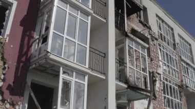 Destroyed residential modern house after air attack. War in Ukraine. Catastrophe. Holes in the walls from shells. Catastrophe. Aerial. Gostomel city. 