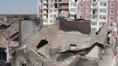 Destroyed residential modern house after air attack. War in Ukraine. Catastrophe. Holes in the walls from shells. Catastrophe. Aerial. Gostomel city. 