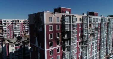 Destroyed residential modern house after air attack. War in Ukraine. Catastrophe. Holes in the walls from shells. Catastrophe. Aerial. Gostomel city. 