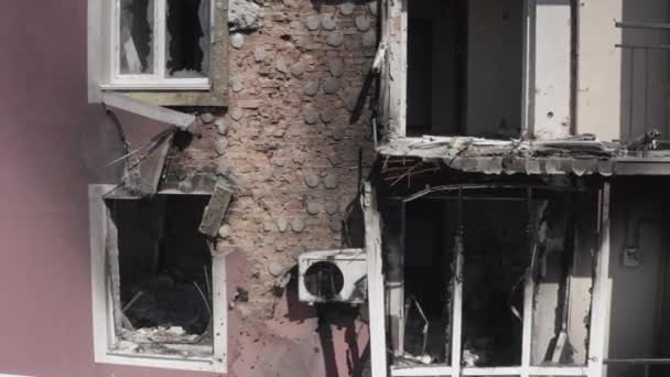 Destroyed residential modern house after air attack. War in Ukraine. Catastrophe. Holes in the walls from shells. Catastrophe. Aerial. Gostomel city. 
