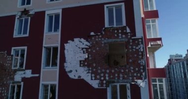 Destroyed residential modern house after air attack. War in Ukraine. Catastrophe. Holes in the walls from shells. Catastrophe. Aerial. Gostomel city. 