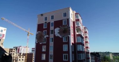 Destroyed residential modern house after air attack. War in Ukraine. Catastrophe. Holes in the walls from shells. Catastrophe. Aerial. Gostomel city. 