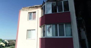 Destroyed residential modern house after air attack. War in Ukraine. Catastrophe. Holes in the walls from shells. Catastrophe. Aerial. Gostomel city. 