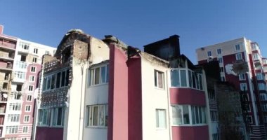 Destroyed residential modern house after air attack. War in Ukraine. Catastrophe. Holes in the walls from shells. Catastrophe. Aerial. Gostomel city. 