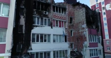 Destroyed residential modern house after air attack. War in Ukraine. Catastrophe. Holes in the walls from shells. Catastrophe. Aerial. Gostomel city. 