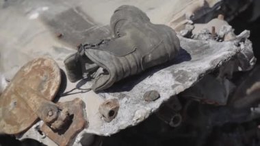 Burnt military equipment after a missile attack. Abandoned rusty military equipment. City of Irpin. Ukraine. War.