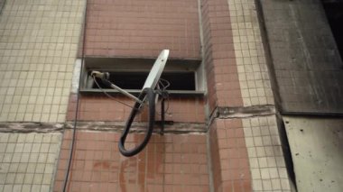 The apartment of the inhabitants after the evacuation during the bombing of a peaceful city. Left belongings of residents. Bombed apartments. Fire in the house. Traces of hits from. Irpin. Ukraine.