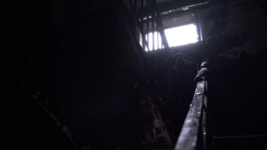 The apartment of the inhabitants after the evacuation during the bombing of a peaceful city. Left belongings of residents. Bombed apartments. Fire in the house. Traces of hits from. Irpin. Ukraine.