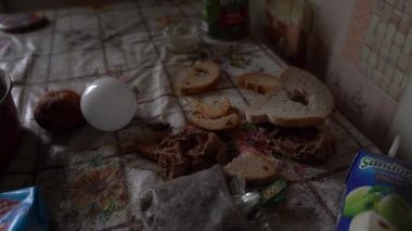 The apartment of the inhabitants after the evacuation during the bombing of a peaceful city. Left belongings of residents. Bombed apartments. Fire in the house. Traces of hits from. Mariupol. Ukraine.