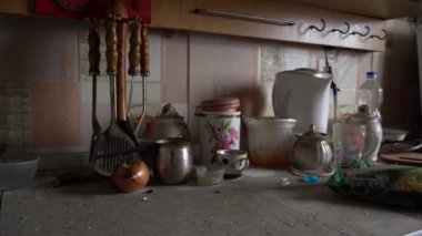 The apartment of the inhabitants after the evacuation during the bombing of a peaceful city. Left belongings of residents. Bombed apartments. Fire in the house. Traces of hits from. Mariupol. Ukraine.