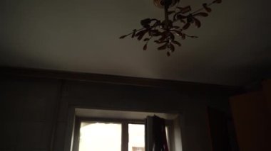 The apartment of the inhabitants after the evacuation during the bombing of a peaceful city. Left belongings of residents. Bombed apartments. Fire in the house. Traces of hits from. Mariupol. Ukraine.