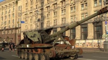 Kyiv, Ukraine - August 24, 2022: Independence Day on Kiev's central street Khreshchatyk. Destroyed burnt Russian military equipment in the center of Kyiv. Parade on Independence Day. 