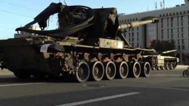 Kyiv, Ukraine - August 24, 2022: Independence Day on Kiev's central street Khreshchatyk. Destroyed burnt Russian military equipment in the center of Kyiv. Parade on Independence Day. 