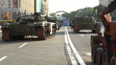 Kyiv, Ukraine - August 24, 2022: Independence Day on Kiev's central street Khreshchatyk. Destroyed burnt Russian military equipment in the center of Kyiv. Parade on Independence Day. 