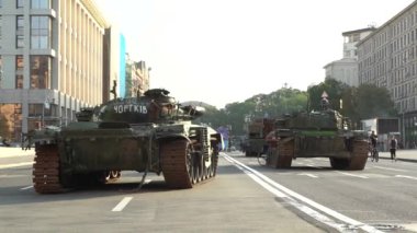 Kyiv, Ukraine - August 24, 2022: Independence Day on Kiev's central street Khreshchatyk. Destroyed burnt Russian military equipment in the center of Kyiv. Parade on Independence Day. 