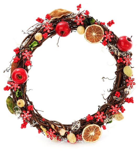 A seasonal wreath decorated with a dried oranges and floral details — Stock Photo, Image