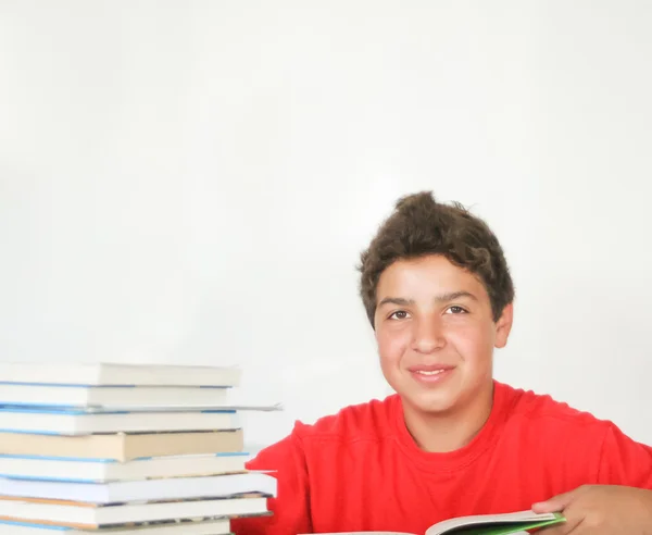 Happy teen male student with books — Stock Photo, Image