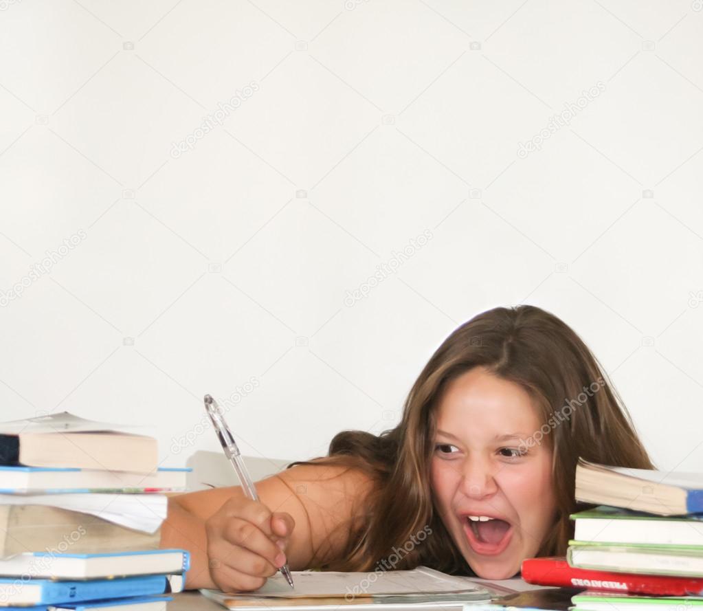 Screaming happy female teen student with books