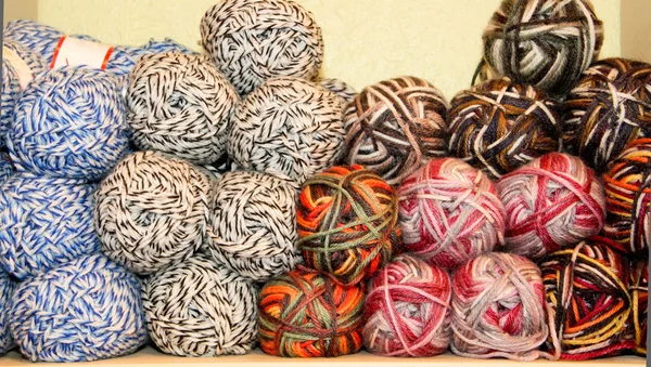 Variegated yarn skeins on display — Stock Photo, Image