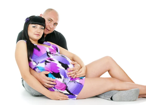 Pregnant couple lying — Stock Photo, Image