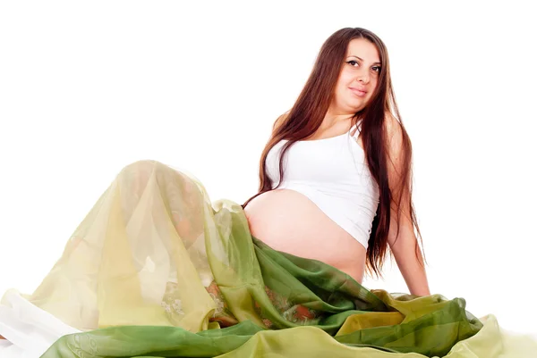 Una chica embarazada con un velo verde — Foto de Stock