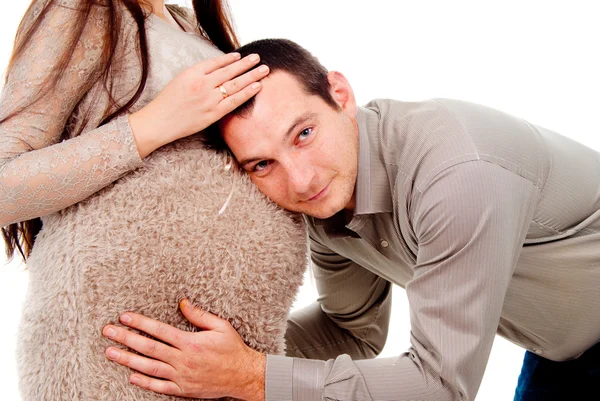 The husband kisses the pregnant wife of the stomach — 스톡 사진