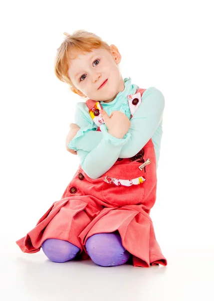 Uma menina brinca, cuidado. — Fotografia de Stock