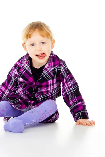 A little girl sits, have fun — Stock Photo, Image