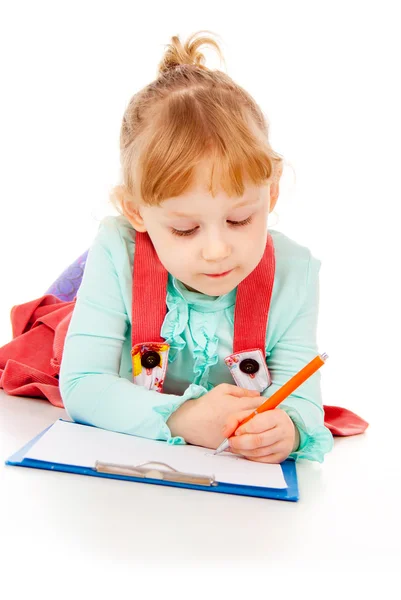 The little girl draws Stock Photo