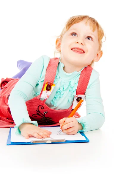 The little girl draws Stock Image