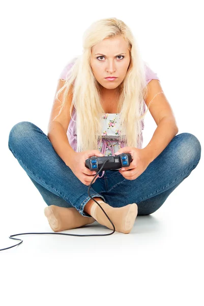 Girl playing video games on the joystick — Stock Photo, Image