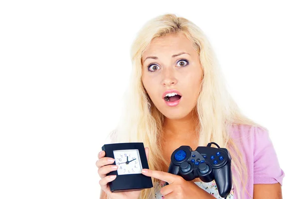 Girl surprised with a joystick and a clock — Stock Photo, Image